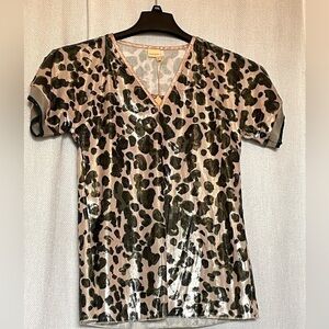 Monoplaza NWT Leo metallic leopard top